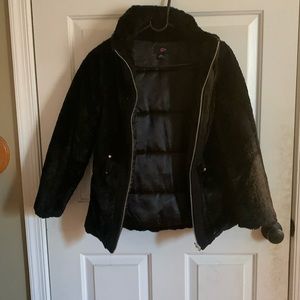 Used black faux fur girls coat has two pockets it has belt loops with no belt